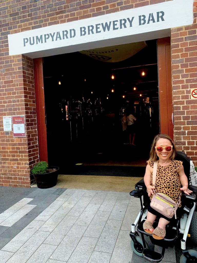 Beth at the entrance to Pumpyard Brewwery Bar